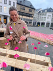 Kim vult de H met sakura bloemen 